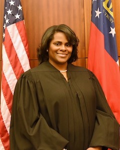 Photo of guest Monique Walker in a judges robe